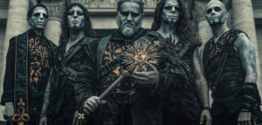 Powerwolf performing live on stage with dramatic lighting and pyrotechnics during Wolfsnächte Tour